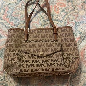 Michael Kors purse.     Just can use it anymore.   Went different route